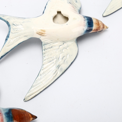 54 - Graduated set of 3 Beswick swallow wall ornaments, pattern no. 757, largest length 16cm