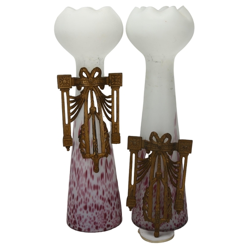 63 - A pair of mottled opaque glass vases with applied cast gilt-metal mounts, height 46cm