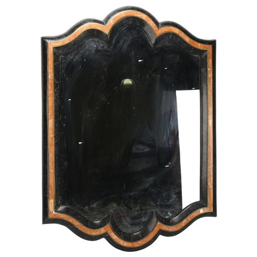 65 - A two-colour marble framed wall mirror, with inlaid brass bands, height 73cm, width 52cm