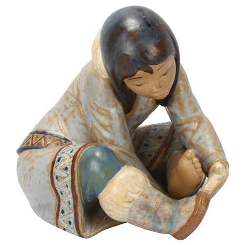 89 - Lladro Eskimo girl, height 15cm