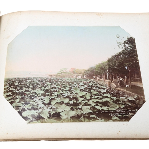92 - An album of hand tinted original photographs depicting palaces and street scenes in Japan circa 1900... 