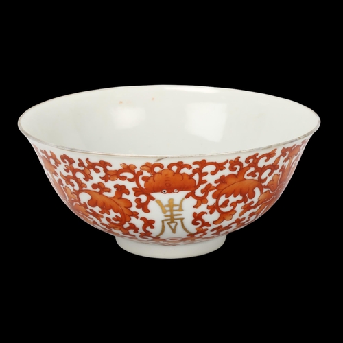 95 - A Chinese white glaze porcelain bowl with painted geometric designs, 4 character mark, diameter 16cm