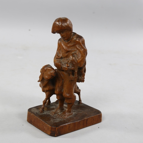 798 - A wood carving circa 1900, man with goat and kid, possibly Italian, unsigned, height 20cm