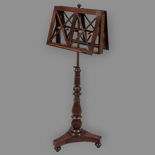 132 - A 19th century mahogany duet music stand, with brass telescopic column