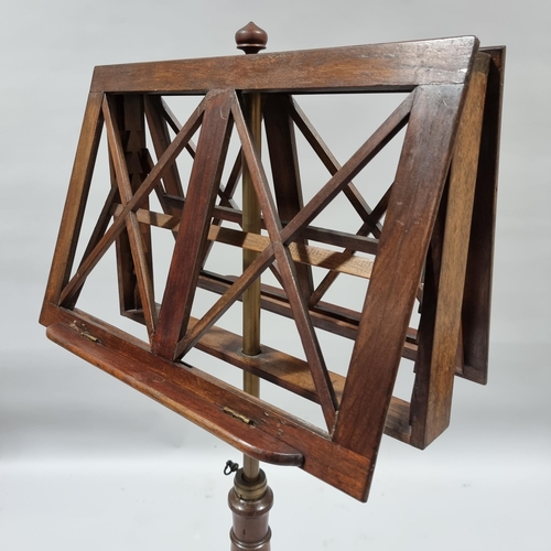 132 - A 19th century mahogany duet music stand, with brass telescopic column