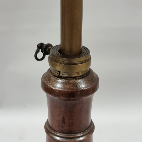 132 - A 19th century mahogany duet music stand, with brass telescopic column