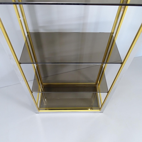 2239 - A mid-century Hollywood Regency style display shelf, with chrome and brass frame and six smoked glas... 