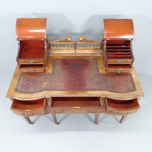 2000 - A late Victorian rosewood and marquetry inlaid Carlton House style writing desk, With lid and drawer... 