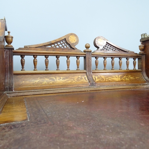 2000 - A late Victorian rosewood and marquetry inlaid Carlton House style writing desk, With lid and drawer... 