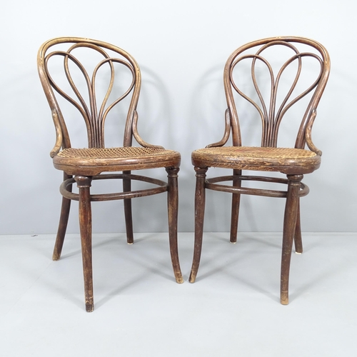 2002 - A pair of 19th century Thonet no. 25 bentwood side chairs with incised line and dot decoration, with... 