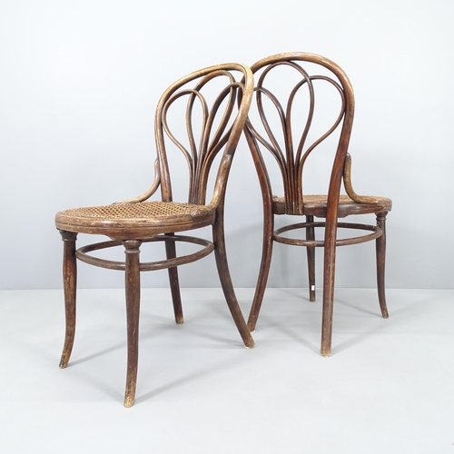 2002 - A pair of 19th century Thonet no. 25 bentwood side chairs with incised line and dot decoration, with... 