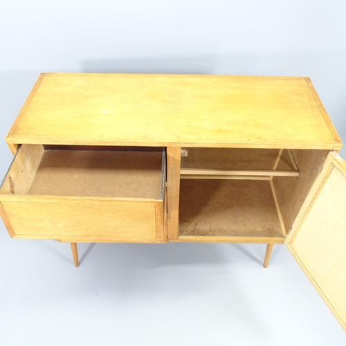 2018 - A mid-century style teak sideboard with three drawers besides single cupboard, and raised on tapered... 