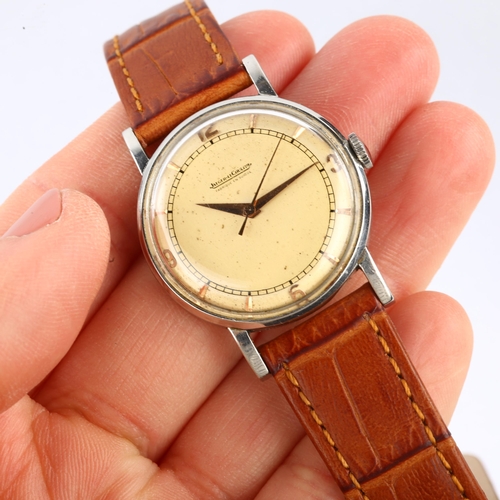 1010 - JAEGER LECOULTRE - a Vintage stainless steel mechanical wristwatch, circa 1950s, silvered dial with ... 