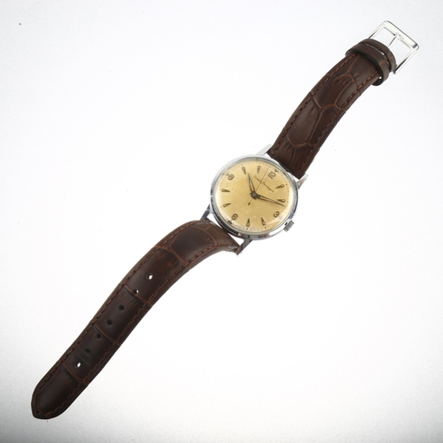 1028 - GIRARD-PERREGAUX - a Vintage stainless steel mechanical wristwatch, silvered dial with gilt quarterl... 