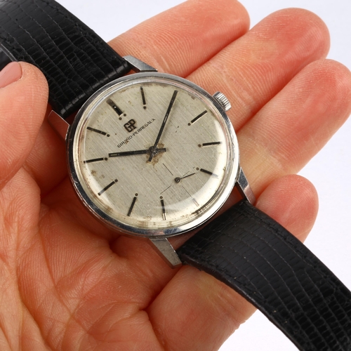 1029 - GIRARD-PERREGAUX - a Vintage stainless steel mechanical wristwatch, silvered dial with baton hour ma... 