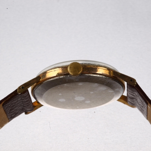 1031 - MOVADO - a gold plated stainless steel mechanical wristwatch, ref. 1031, silvered dial with gilt bat... 