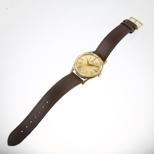 1033 - MOVADO - a gold plated stainless steel Kingmatic automatic wristwatch, ref. 55179, silvered dial wit... 