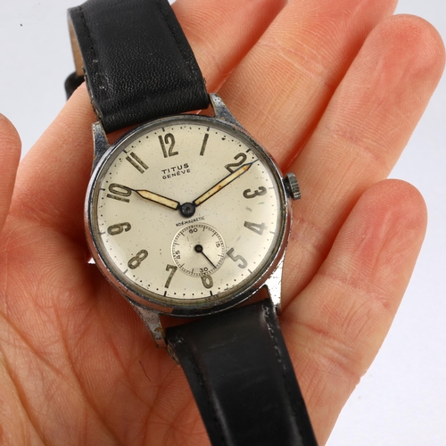 1053 - TITUS - a Vintage stainless steel mechanical wristwatch, silvered dial with Arabic numerals, luminou... 