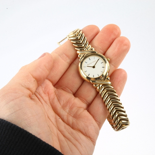 1055 - BUECHE GIROD - a lady's 9ct gold quartz bracelet watch, ref. 6006, white dial with Roman numeral hou... 
