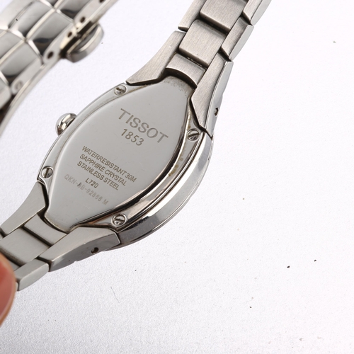 1058 - TISSOT - a lady's stainless steel T-Trend Oval quartz bracelet watch, ref. L720, mother-of-pearl dia... 