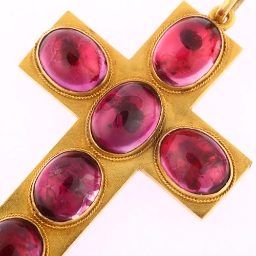 1103 - A Victorian garnet cross pendant, unmarked yellow metal closed-back settings, with oval cabochon gar... 