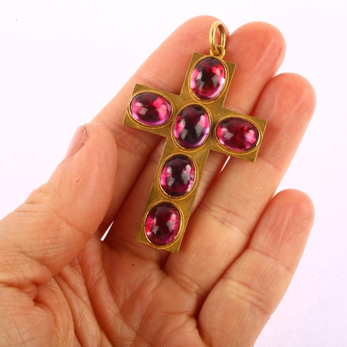 1103 - A Victorian garnet cross pendant, unmarked yellow metal closed-back settings, with oval cabochon gar... 