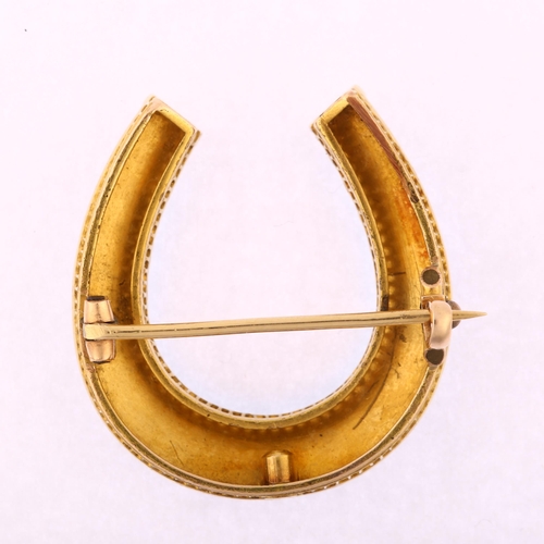 1107 - A large Victorian turquoise and pearl horseshoe brooch, unmarked gold settings with oval cabochon tu... 