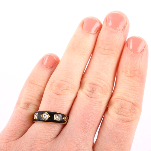 1113 - A 19th century 18ct gold three stone black enamel and diamond memorial band ring, set with old Europ... 