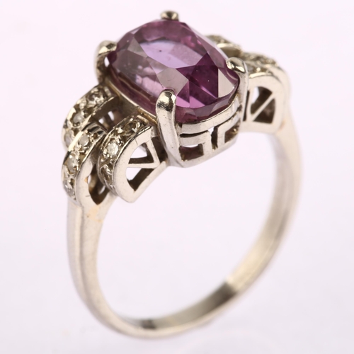 1117 - An Art Deco synthetic flux melt purple sapphire and diamond cocktail ring, circa 1940s, unmarked whi... 