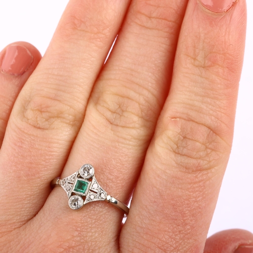 1119 - An Art Deco 18ct white gold emerald and diamond panel ring, geometric design set with square step-cu... 