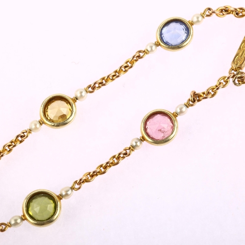 1120 - An Austro-Hungarian 14ct gold gem set bracelet, Vienna 1867 - 1922, cable links set with blue topaz ... 