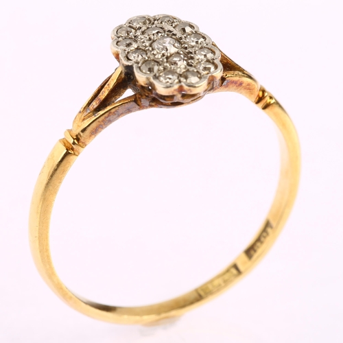 1124 - An 18ct gold diamond cluster panel ring, platinum-topped set with old and single-cut diamonds, total... 