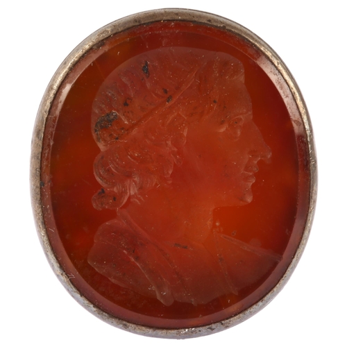 1127 - An Antique carnelian intaglio seal fob, with carved Classical male profile, unsigned, in white metal... 