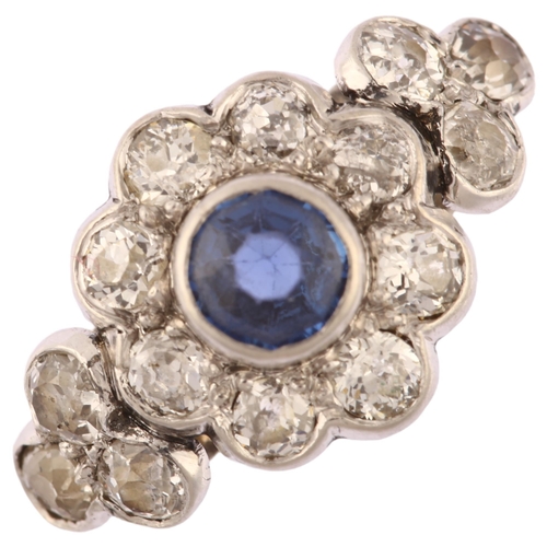 1129 - A sapphire and diamond flowerhead cluster ring, unmarked white metal settings with round-cut sapphir... 