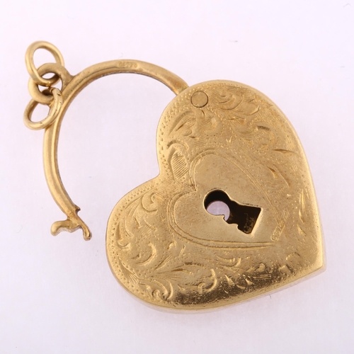 1131 - A 9ct gold heart padlock clasp/pendant, possibly Antique and re-hallmarked, engraved foliate and hea... 