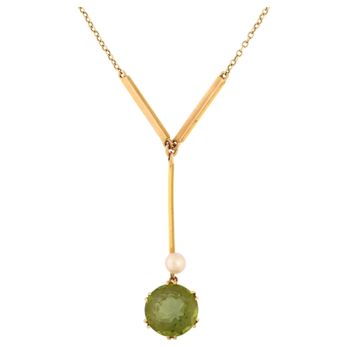 1132 - An Edwardian 15ct gold peridot and pearl drop pendant necklace, set with round-cut peridot, peridot ... 