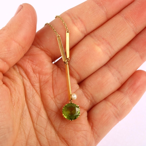 1132 - An Edwardian 15ct gold peridot and pearl drop pendant necklace, set with round-cut peridot, peridot ... 