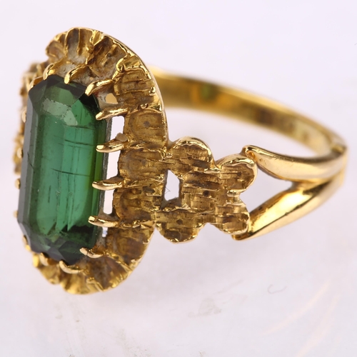 1140 - An early 20th century 18ct gold green tourmaline dress ring, set with octagonal step-cut tourmaline ... 