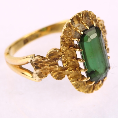 1140 - An early 20th century 18ct gold green tourmaline dress ring, set with octagonal step-cut tourmaline ... 