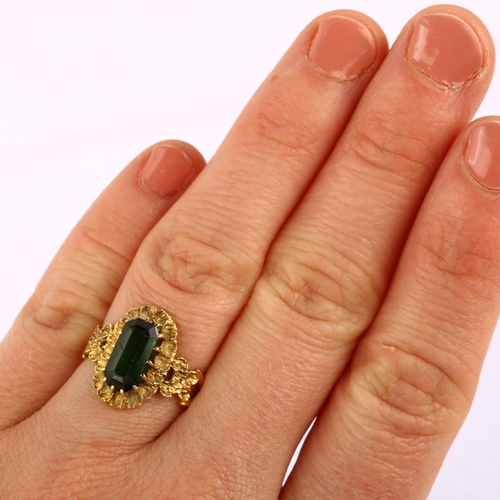 1140 - An early 20th century 18ct gold green tourmaline dress ring, set with octagonal step-cut tourmaline ... 