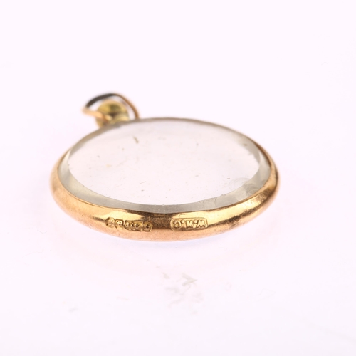 1152 - An Edwardian 9ct gold glass photo locket pendant, maker's marks WHC, hallmarks Birmingham 1905, diam... 