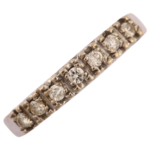 1161 - A late 20th century 18ct white gold seven stone diamond half eternity ring, prong set with modern ro... 