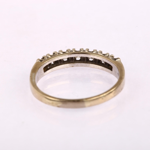 1161 - A late 20th century 18ct white gold seven stone diamond half eternity ring, prong set with modern ro... 