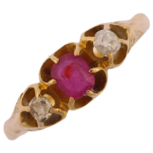 1162 - An early 20th century 18ct gold three stone ruby and diamond gypsy ring, ruby measures 4.34 x 3.90 x... 