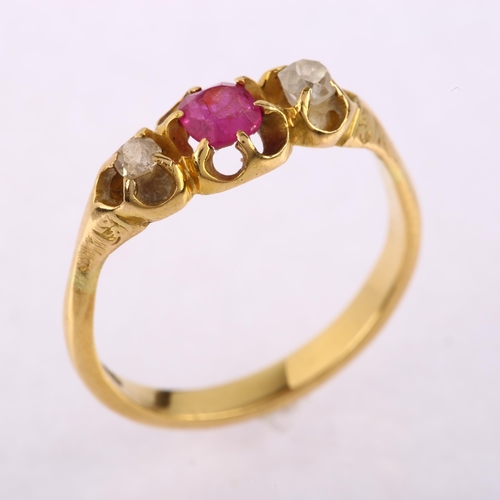 1162 - An early 20th century 18ct gold three stone ruby and diamond gypsy ring, ruby measures 4.34 x 3.90 x... 