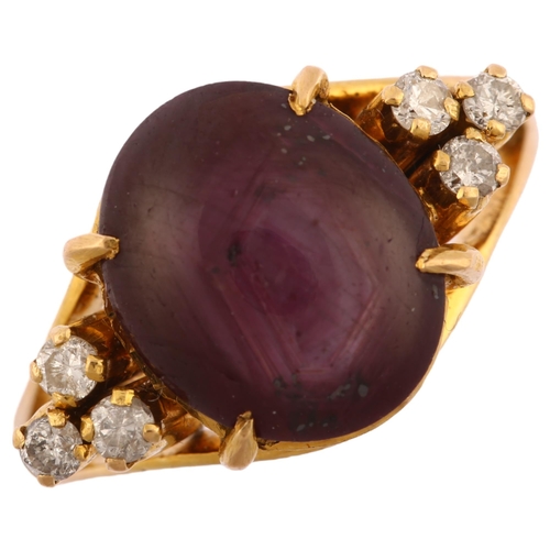 1163 - A late 20th century star ruby and diamond eye dress ring, unmarked gold settings with oval cabochon ... 