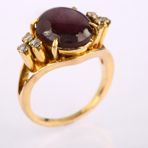 1163 - A late 20th century star ruby and diamond eye dress ring, unmarked gold settings with oval cabochon ... 