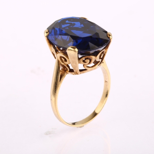 1165 - A large late 20th century 9ct gold blue synthetic spinel dress ring, set with oval mixed-cut spinel,... 