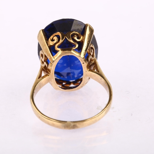 1165 - A large late 20th century 9ct gold blue synthetic spinel dress ring, set with oval mixed-cut spinel,... 