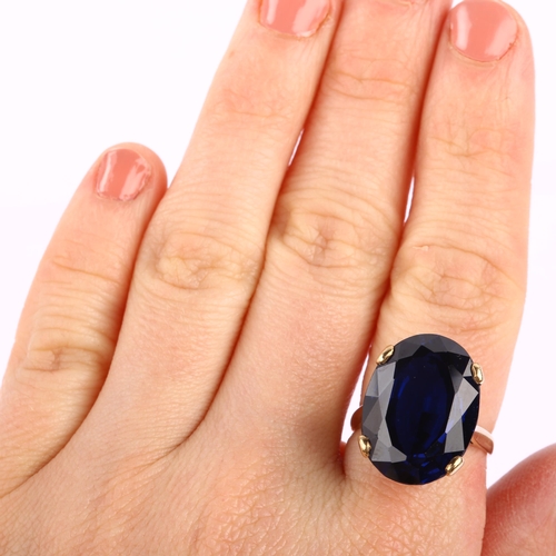 1165 - A large late 20th century 9ct gold blue synthetic spinel dress ring, set with oval mixed-cut spinel,... 